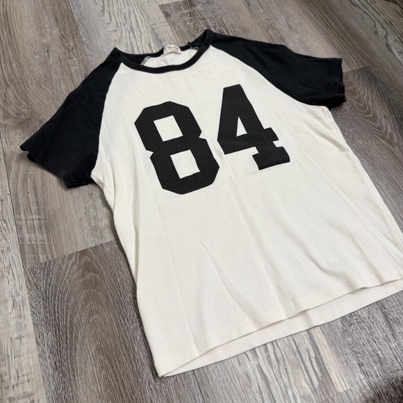 Brandy Melville Tops - Brandy Melville John Galt black and white baseball tshirt fits size xs-s